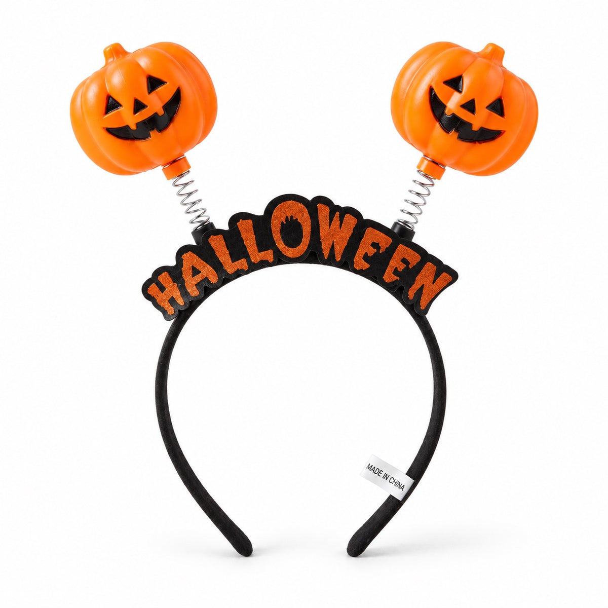 Black Halloween headband with orange lettering and two pumpkin decorations on springs
