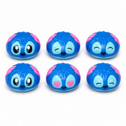 Blue rainbow mystery bun squishy fidget toys with assorted facial expressions